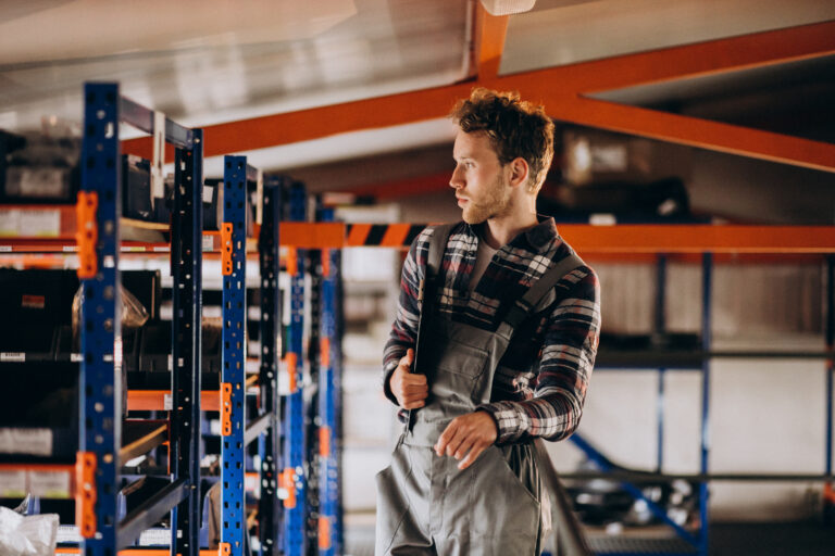 man working at a carboard factory